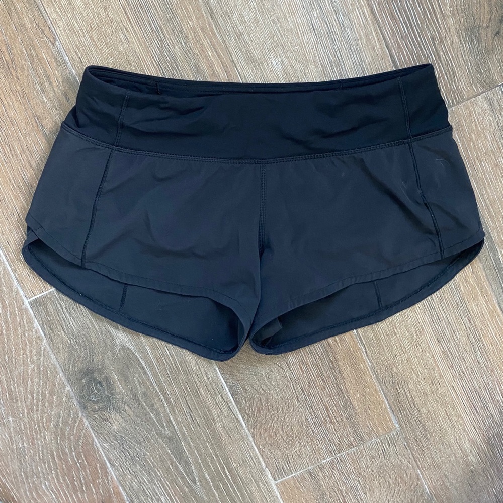 Speed up short 2.5 in Black. Size 4